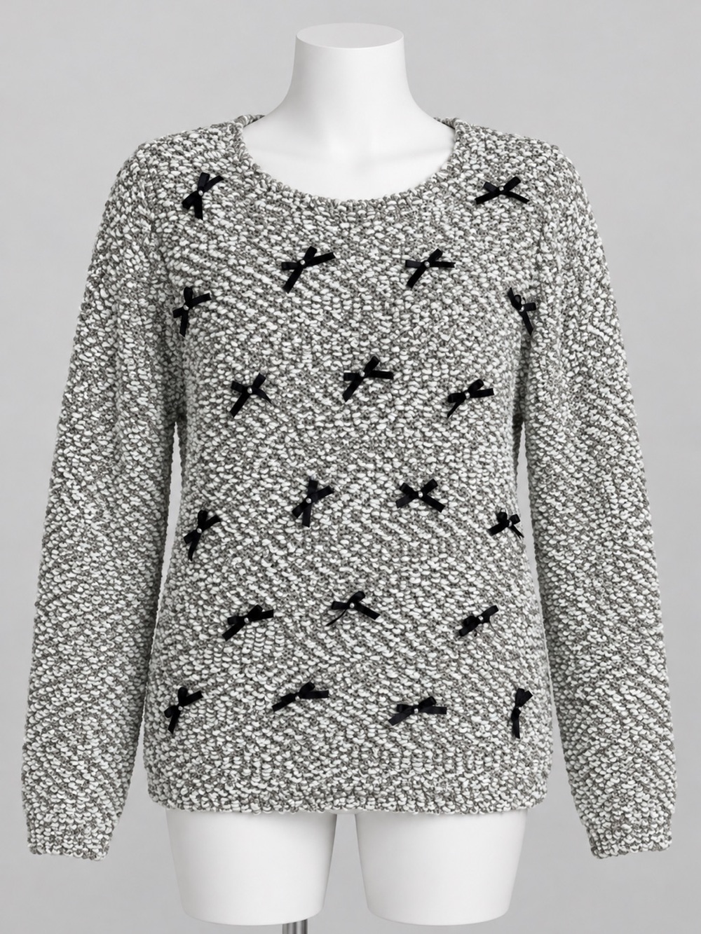 Cozy Cream Colored Bouclé Sweater with Black Bow Accents